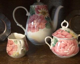 Teapot, sugar pot and creamer made from compressed wedding cookies