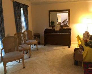 chairs on wheels for when you want to slowly escape a boring dinner party to the kitchen where the whiskey is stored.