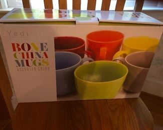 Bone china mugs of all colors we don't judge