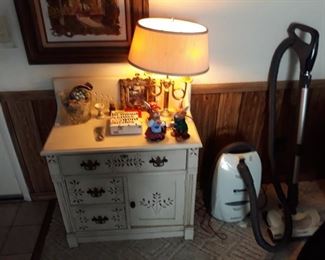 Cabinet, Lamp, Vacuum, and Decor