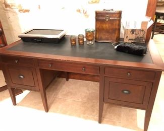 Desk with Leather Top and Decorative Items