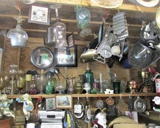 TONS of vases and glassware, plus vintage trivets, wall hangings, kitchenware, art, helmets, sports equipment, and more.