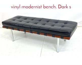 Lot 189 Contemporary tufted black vinyl modernist bench. Dark s