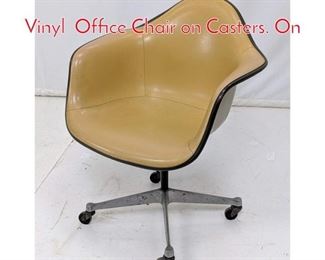 Lot 448 HERMAN MILLER Yellow Vinyl Office Chair on Casters. On