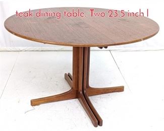 Lot 526 JO CARLSSON VETLANDA teak dining table. Two 23.5 inch l