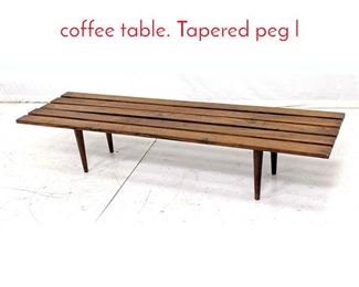 Lot 547 Modernist walnut slat bench coffee table. Tapered peg l