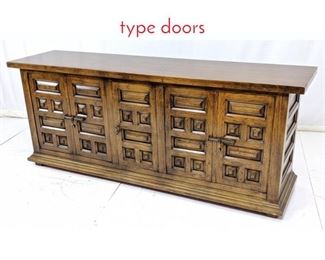 Lot 312 Paneled Low chest with barn type doors