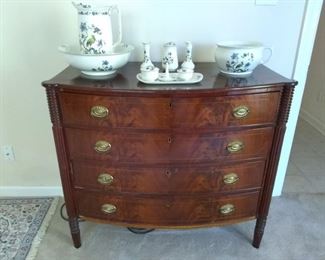 Antique curved front chest of drawers