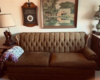 Hide a bed sofa with wood trim - in great condition