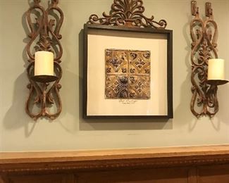 Cast Iron sconces and framed architectural details.