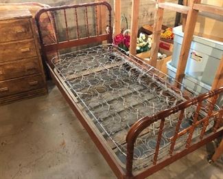 2 old metal twin beds