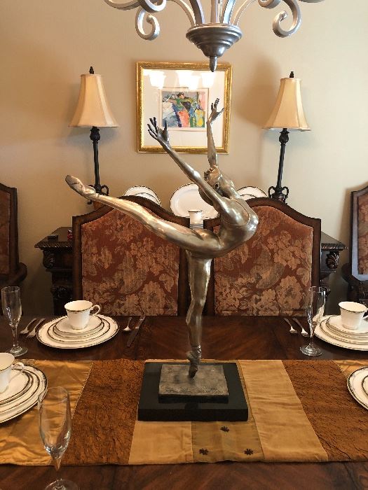 Arabesque, by Rebecca Anelise Clark. Simply spectacular bronze ballerina.
A limited edition, this piece is signed and numbered 330/500. Ms. Clark has created over 100 masterworks. Her depiction of two battling stallions stands over 24 feet tall. Her pieces are now commanding prices in excess of $500,000