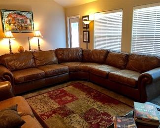 Bernhardt leather sectional sofa. Three pieces. 
Dimensions:
Width 112"
Depth 112"
Height 37 1/2"
Arm Height 27 1/2"
Seat Depth 20"