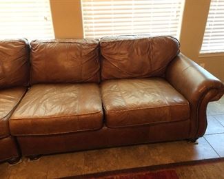 Bernhardt leather sectional sofa. Three pieces. 
Dimensions:
Width 112"
Depth 112"
Height 37 1/2"
Arm Height 27 1/2"
Seat Depth 20"