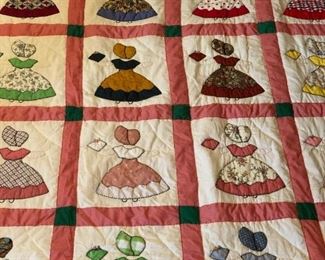 Sunbonnet Sue quilt. 90” x 82”. Also hand work with crocheted flower baskets. No rips stains or tears.