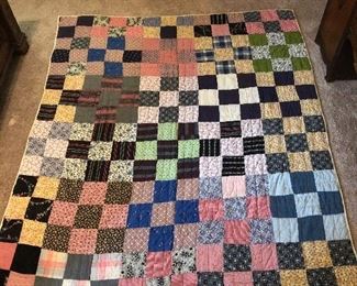 Feed sack, simply squares, hand quilted and machine stitched. No rips, stains, tears. Excellent vintage condition. 82” x 67”.