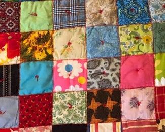 Simply squares. Zigzag machine stitch. Top to top, puffy back. Same squares front and back. Heavy. No rips, stains,  or tears. Excellent vintage condition. 81” x 62”