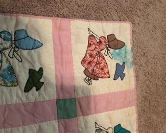 Sunbonnet Sue/Birdie quilt. All hand quilted. Light age spots. Stain on one corner. Solid pink backing. 75” x 64”