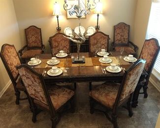 William and Mary English manor style dining room table with eight chairs and one leaf. Seats six without leaf, eight with leaf.