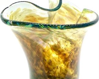 A talented artist in his own right, our client has allowed us to offer a portion of his collection in this sale. This is one of many pieces of blown glass created by our client. 