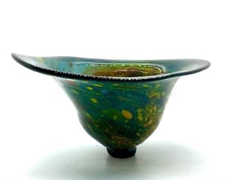 A talented artist in his own right, our client has allowed us to offer a portion of his collection in this sale. This is one of many pieces of blown glass created by our client. 