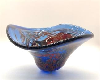A talented artist in his own right, our client has allowed us to offer a portion of his collection in this sale. This is one of many pieces of blown glass created by our client. 