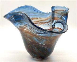 A talented artist in his own right, our client has allowed us to offer a portion of his collection in this sale. This is one of many pieces of blown glass created by our client. 