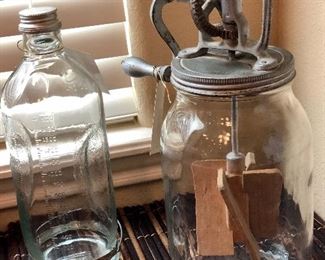 Vintage hand turn butter churn on Ball jar. 