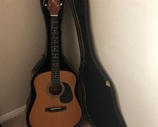 Jasmine S-35 dreadnought acoustic guitar by Taka mine. Has a big, bold sound, is well built and easy to play. Comes with hardshell guitar case and two pics.