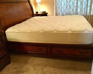 King sized aspenhome Sleighbed. Headboard and footboard frame over four cedar lined under bed drawers.
Beautiful detail. 