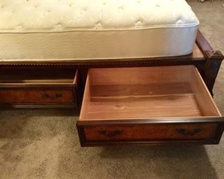 King sized aspenhome Sleighbed. Headboard and footboard frame over four cedar lined under bed drawers.
Beautiful detail. 