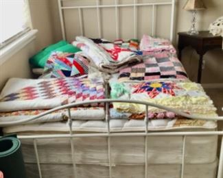 Full size white iron bed, mattress and box springs.