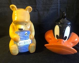 Vintage Winnie the Pooh cookie jar and 1994 Daffy Duck cookie jar