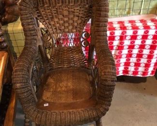 Antique high wicker chair