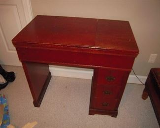 Sewing machine cabinet