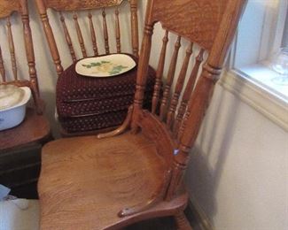 6 of these nice reproduction pressed back chairs