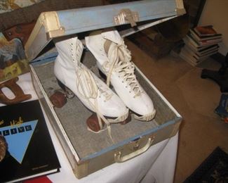Vintage roller skates and case