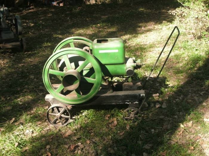 John Deere E-Series engine.  It is larger than a 1 1/2 hp engine and is believed to be a 3 hp engine.