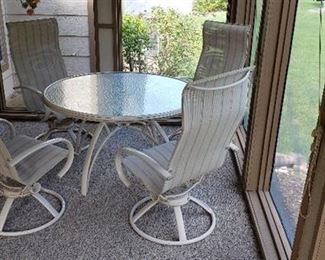 Glass Top Table Patio Set with 4 Matching Spring Rocking Chairs - 48  diameter