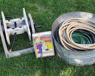 Suncast Hose Reel, Galvanized Wash Basin with Hoses, and Water Boy - hose in a box