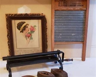 Lot of Vintage Household Items - Framed 1916 Calendar, Washboard, Newspaper Roller, and 2 Sad Irons with one handle
