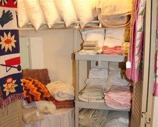 linen closet with pillows