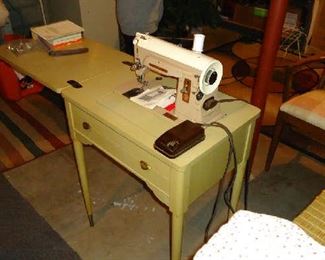 ONE OF THREE SEWING MACHINES