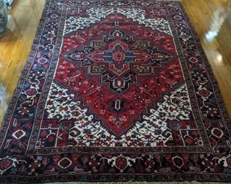 Vintage, hand woven Persian Heriz rug, 100% wool face, measures 7' x 10'.