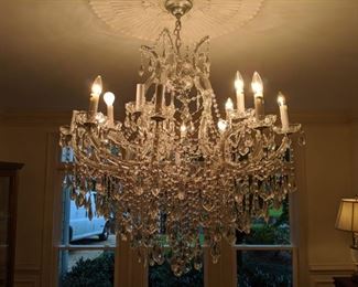 Close-up of the Maria Theresa 30" wide, 2-tier 19-light crystal chandelier.