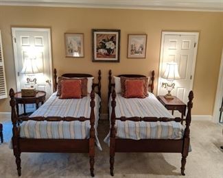 Beautiful pair of 1940's mahogany twin beds, with striped Libeco (Belgium) linens, 1940's drop-leaf single drawer side table, 2-tier mahogany side table.