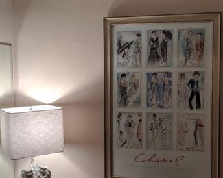Vintage, framed Chanel fashion poster and contemporary shell lamp, by Surya.