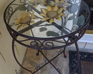 Pair of vintage wrought iron side tables, with sunflowers & glass tops.