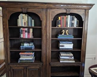 Pair of heavy wooden bookshelves, by Cushman Classics, N. Bennington, VT, filled with good coffee table books.