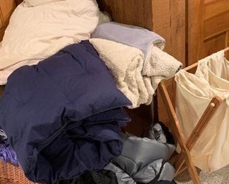 Twin comforters, blankets, sheet set , mattress cover, air mattress, sleeping bags,
3 section laundry stand, wicker dog bed